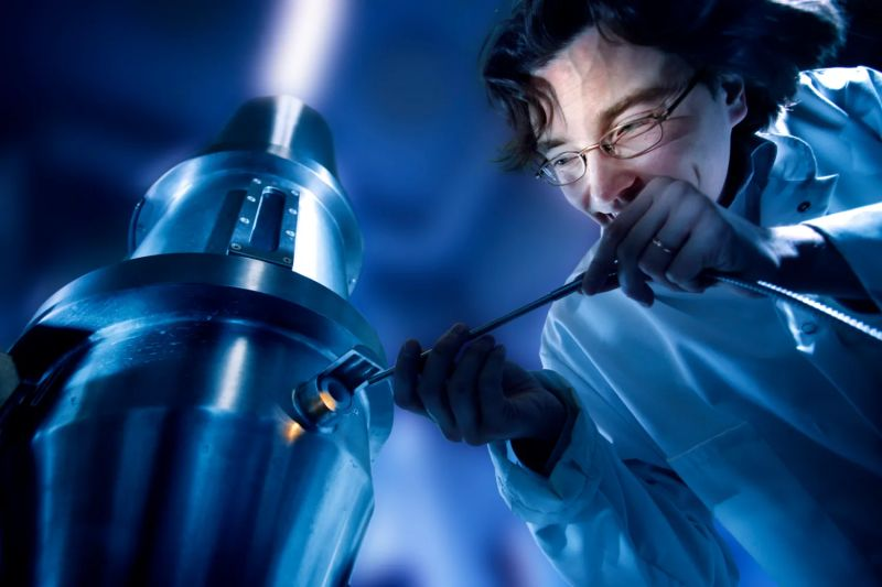 Researcher working with laboratory equipment